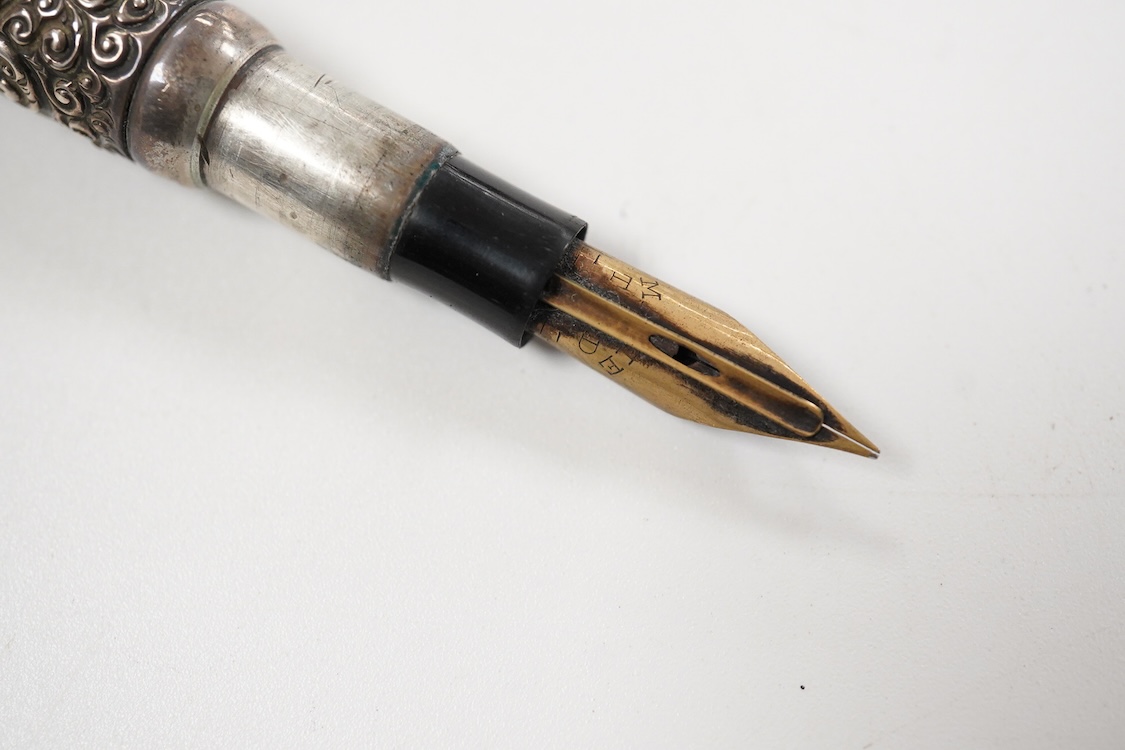 A Mabie Todd & Co. Sterling silver snail pattern eye dropper with flexible nib with over-and-over feed, No.3 size